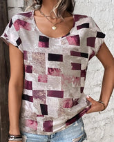 T-shirt med geometriskt tryck och rund hals